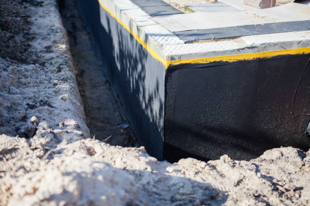 Professional Waterproofing technician working in Cambria, IL